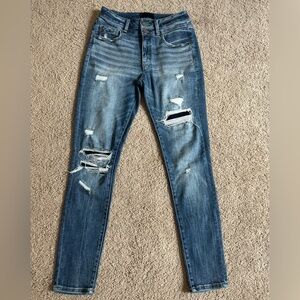 Buckle Black skinny jeans with tummy control panel